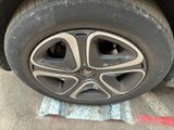a close up of a tire on a car ' s rim