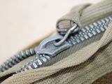 a close up of a zipper on a bag