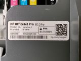 a close up of a printer with a qr code on it