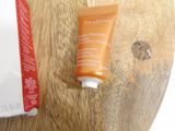 a tube of sunscreen cream next to a tube of sunscreen cream