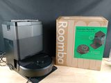 a coffee maker that is sitting next to a box