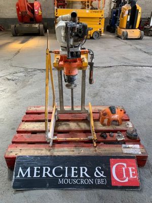 a close up of a machine on a pallet in a warehouse