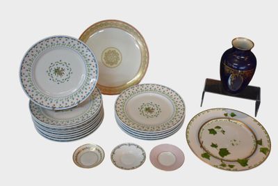 a lot of plates that are sitting on a table