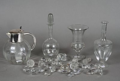 a lot of glass items that are sitting on a table