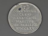 a close up of a silver coin with the words convention club written on it