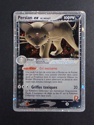 une image d'une carte Pokémon sur laquelle figure un chat
