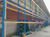 a building that has a lot of scaffolding on the side of it