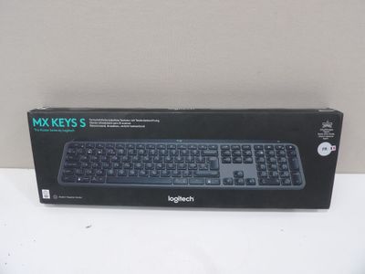 a box with a keyboard inside of it on a table