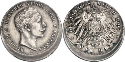 a close up of a silver coin with an eagle on it