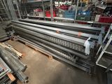 a lot of metal shelves in a warehouse with many different types of items