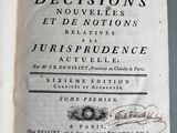 an open book with a black and white title on it