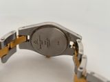 an image of a close up of a watch on a white surface