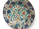 an image of a decorative plate with flowers on it