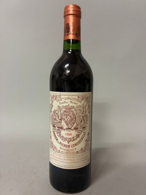 a bottle of wine that is sitting on a table