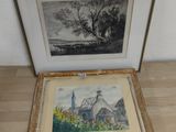 une photo d'une photo posée sur une table, à côté d'une photo d'un bâtiment