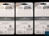 three packs of nintendo wii game cards sitting on top of each other