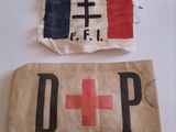 two pieces of cloth with a cross and a red cross on them
