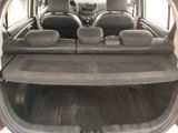 the back of a car with the back seats folded down and the back seats folded down