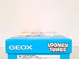 a box of looney tunes sitting on a table