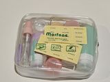 a plastic container filled with toothbrushes and toothpaste
