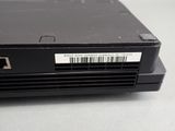 a close up of a laptop with a barcode on it