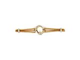 une bague en or jaune sertie d'une pierre blanche et de diamants