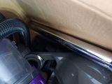 a purple vacuum that is sitting in a box