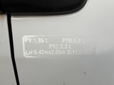 a white car with a sticker on the side of it