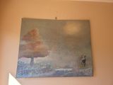 a painting on the wall of a bedroom with a bed