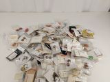 a pile of cards on a table with a white background