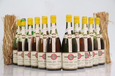 six bottles of wine are lined up in a row