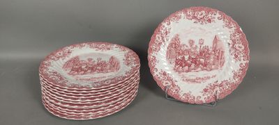 un lot de six assiettes rouges et blanches ornées de châteaux
