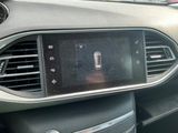 the dashboard of a car with a digital display in the center