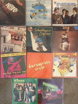 various cd ' s of various albums and cds are on the floor