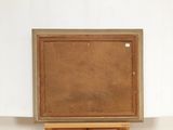 a picture of an easel with a painting on it