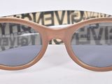 a close up of a pair of sunglasses on a white surface