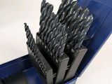 a blue box with a bunch of drill bits in it