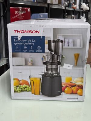 une boîte sur laquelle figure l'image d'un extracteur de jus