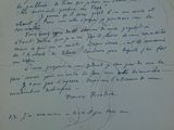 une vieille lettre manuscrite avec la photo du visage d'une femme