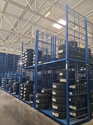 a large warehouse filled with lots of tires and shelves