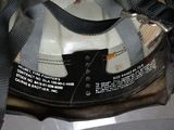 a helmet that is sitting on the seat of a motorcycle