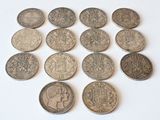 a lot of coins that are sitting on a table