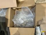 many boxes of assorted items sitting on the floor