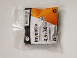 a bag of batteries on a table with a price tag