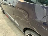 a car that is parked on the side of the street