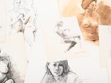 many sketches of people sitting on a table