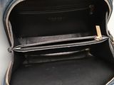the inside of a blue purse with a zipper on it