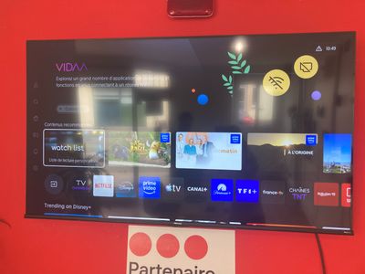 a flat screen tv mounted on the wall in a room