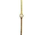 a close up of a wrist watch on a white background