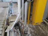 a picture of a machine that is working on a piece of wood